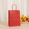 Bolsa de papel Kraft de color sólido al por mayor de fábrica, bolsa de papel creativa para embalaje de regalo, bolso de mano para snacks de actividades, se puede personalizar la imagen
