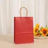 Color sólido en stock bolsa de regalo dulces joyería empaque papel kraft blanco papel de color bolso de mano bolsa de regalo bolsa de compras