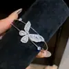 ¡El Lenguaje de los Tulipanes! Pulsera de Flor Mariposa de Piedra Ojo de Gato Rosa, Lujo Ligero y Sensación de Alta Gama, Joyería de Mano Dulce y Delicada