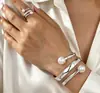 Joyería para Manos de Venta Caliente Transfronteriza Europea y Americana Diseño de Textura Metálica Conjunto de Anillo Brazalete Abierto Geométrico Joyería Estilo Punk