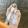 Llavero de Muñeca Creativa de Frijol de Azúcar al Óleo de Dibujos Animados Lindo Colgante para Mochila Escolar de Estudiante con Arena Movediza Regalo Pequeño para Pareja Venta al por Mayor