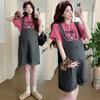 En stock Estilo Nuevo Mujeres Embarazadas Estilo Coreano Reductor de Edad Juguetón Ropa de Trabajo de Mezclilla Pantalones de Tirantes Traje para Mujeres Embarazadas Top de Manga Corta