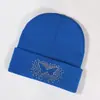 Chapéu de tricô com strass de borboleta novo transfronteiriço fornecimento direto de fabricantes de chapéus de tricô festa outono e inverno explosões
