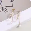 Pendientes de Flor Nueva de 25 Años Pendientes Largos con Borla de Perla Mismo Estilo que las Celebridades de Internet Japonesas y Coreanas Gancho de Oreja Femenino Clip para Oreja