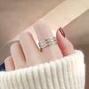 Anillo de Pareja de Moda Trendy de Acero de Titanio Gypsophila para Hombres y Mujeres Estilo Hong Kong Simple de Alta Gama con Diamantes de una y dos filas