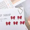 Accesorios populares para arte de uñas con lazo de estampado de leopardo estilo chica popular, tachuelas de uñas con lazo tridimensional versátiles, dulces y geniales, y decoraciones de resina