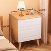 Mesita de noche de madera maciza para dormitorio del hogar 2026 Venta caliente Creativa Pequeño Armario de almacenamiento simple para niños Mesita de noche de tronco