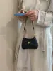 Verano 2026 Nuevo Estilo Coreano Ins Cubo Moda Bolso para Niña Pequeña Cadena con Patrón de Diamantes Cruzado Bolso para Mujer al por Mayor