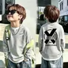 Camiseta de manga larga de punto gofre para niños, nuevo estilo primavera y otoño 2026, suéter para bebé, camiseta de dos en uno de moda para niños mayores