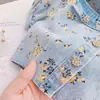 Conjunto Jeans Estilo Coreano para Meninas Verão 2026: Conjunto de Duas Peças: Top Jeans de Manga Curta com Gola Reversível + Shorts Florais