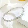 Pulseira de Zircônia da Moda Europeia e Americana Mais Vendida Cruzada Padrão Losango Aço Inoxidável Joia Popular Banhada a Ouro 18K Joia de Mão Atacado