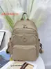 Chi Bao 2025 Nueva Mochila de Tela Oxford Multicolores Bolso de Moda Simple para Mujer Gran Capacidad Mochila de Montañismo 3078-PS
