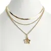 Cadena de Perlas Oceánicas de Venta Caliente Transfronteriza Europea y Americana Cadena para Clavícula de Mujer Colgante de Estrella de Mar y Concha Collar Multicapa Apilable Venta al por Mayor