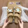 Zuecos Antideslizantes Estilo Eva para Mujer 2026 Sandalias Nuevas Transpirables para Uso en Exteriores Lindo Diseño de Gato de Dibujos Animados