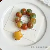 Pulsera de Raíz de Bodhi Multicolor con Cuentas Grandes Talladas en Forma de Ajo, Retorcida a Mano y Suave al Tacto, una Pulsera de Cuentas de Semilla de Bodhi Coleccionable