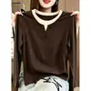 Camiseta elegante de manga larga para mujer, estilo dos piezas con cuello abotonado, top negro moderno y versátil, nuevo modelo otoño 2026