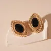 Pendientes de Flor Ovalada Metálica Simples de Era Media con Pasador de Plata Pendientes Retro de Nicho Elegantes de Alta Gama Europeos y Americanos Transfronterizos para Mujer