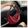 Nova Bolsa de Dumpling de Luxo para Mulheres 2026, Bolsa Transversal Versátil, Bolsa de Ombro da Moda para o Dia a Dia, Design de Nicho, Material de Couro