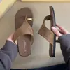 Sandalias de dedo de color liso estilo coreano de nicho para mujer, nuevas sandalias romanas casuales planas para primavera y verano 2026