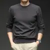 Nuevo Suéter Jacquard de Color Sólido con Cuello Redondo para Hombre Otoño/Invierno 2025 Camisa Base de Punto Simple Moda Casual