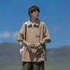 Camisa polo juvenil de verano estilo Hong Kong con inspiración japonesa para hombre, de manga corta, holgada, casual, moderna, con cuello de solapa y media cremallera