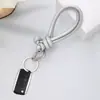Nuevo Cordón Tejido Simple Hecho a Mano de PU para Teléfono Llavero Desmontable Anti-Pérdida Bolso Venta al por Mayor Artículo Popular de Xiaohongshu