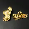 Celebridad de Internet Douyin Transfronteriza Más Vendido Acero Inoxidable Hoja de Loto Amor Ojo de Gato Perla Pendientes Simples y Versátiles Venta al por Mayor