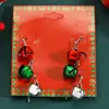 Pendientes de aleación con diseño de alce y copo de nieve, de estilo europeo y americano, con dibujos creativos, para Navidad.
