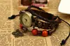 Pulsera de reloj de cuero trenzado multicapa con calavera punk vintage de una sola pieza, directo de fábrica, joyería para pareja y estudiante