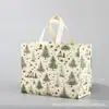 Saco de presente de Natal para comércio exterior saco não tecido revestido impressão colorida grande sacola de compras portátil em estoque atacado personalizado