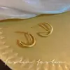 Pendiente de personalidad de metal anillo de viento frío diseño de nicho temperamento europeo y americano pendientes retro en forma de C venta al por mayor