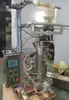 Máquina Empacadora Vertical Totalmente Automática, Máquina Empacadora de Alimentación Manual, Máquina Empacadora de Sello Posterior/Sello a Tres Lados con Cubo de Cadena de Alimentación Manual