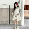 Conjunto de vestido con tirantes para niña 2026 otoño lindo vestido floral para niños mayores versátil vestido corto de dos piezas