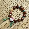 Pulsera de Semillas de Girasol Natural y Raíz de Bodhi con Estrella y Luna Tostada al Carbón Bodhi Pulsera con Borla Linda Estilo Labubu