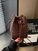 Bolsa de balde tecida em retalhos de nicho da moda, bolsa de telefone de viagem super popular e leve, bolsa de ombro e transversal da moda