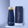 Paraguas de Bolsillo tipo Cápsula para Mujer, Recubrimiento Negro Engrosado, Protección Solar, Paraguas Sombrilla, Paraguas Plegable, Doble Uso para Sol y Lluvia, Sombrilla Solar Personalizada al por Mayor