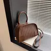 Bolso de mujer con patrón tejido de moda transfronterizo 2026, nuevo bolso de mano cruzado versátil de verano, bandolera individual creativa