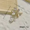 Broche de accesorios de traje de alta gama, hebilla de toalla de seda para niña, ramillete de aleación, broche de tulipán con diamantes de imitación a juego.
