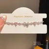 Pulsera con colgante de lazo de circonita estilo coreano para mujer, pulsera de lujo ligero de alta gama, joyería de diseño de nicho de moda al por mayor
