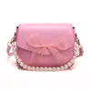Bolso Pequeño de Cadena de Perlas para Mujer 2025 Nuevo de Moda Casual Texturizado con Lazo Bolso de Hombro Cruzado