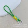 Atacado cordão trançado com nó para celular, chaveiro curto criativo DIY, boneca de pelúcia, alça anti-perda
