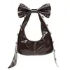 Bolso de hombro dulce y genial de alta gama para mujer, nuevo bolso de moda 2026 con tachuelas personalizadas, bolso de axila con lazo de celebridad de internet