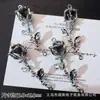 Accesorios de Estilo Oscuro Estilo Europeo y Americano Mariposa Negra Pistola Cruz de Rosa Colgante Pulsera de Cuentas DIY Collar