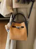 Bolso de mano retro transfronterizo para mujer, nuevo modelo otoño e invierno 2026, bolsa de hombro y cruzada versátil casual de gran capacidad