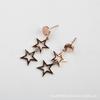 Nueva moda personalidad aretes estrella de cinco puntas oro rosa versión coreana de aretes al por mayor temperamento largo no se desvanece
