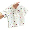 2026 Nuevo Verano Dibujos Animados Elegante Versátil Estampado Completo Corazón Manga Corta Camisa Polo Camiseta para Niños y Niñas