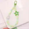 Novo Pingente Chaveiro Estrela de Cinco Pontas em Acrílico Pintado Acessório Criativo com Corrente de Contas Coloridas Decoração para Capa de Fone de Ouvido