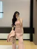 Nuevo Conjunto de Tres Piezas de Punto para Mujer Otoño/Invierno 2026, Top de Tubo + Falda de Cintura Alta + Cárdigan Largo, Estilo 'Hot Girl' de Deseo Puro