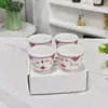 Vendas Diretas Transfronteiriças dos Copos de Mão da Família Copen, Renda Azul e Vermelha, Quatro Copos, Porcelana Óssea Doméstica com Decoração Azul e Branca em Subglace