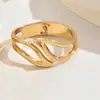 Diseño de Exportación Europeo y Americano Pulsera Metálica Brillante Anillo de Industria Pesada Hoja Calada Geométrico Asimétrico Pulsera de Aleación